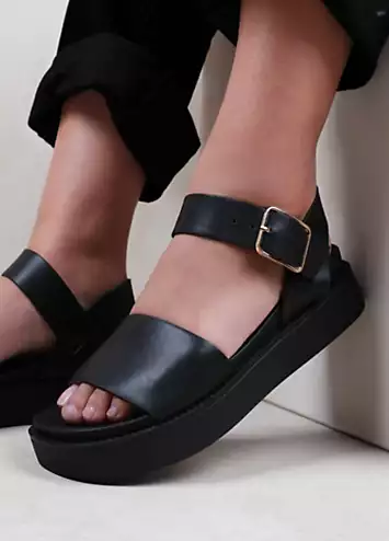 Where’s That From Phoenix Black Buckle Flat Sandals | Kaleidoscope