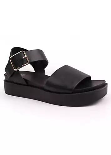 Where’s That From Phoenix Black Buckle Flat Sandals | Kaleidoscope